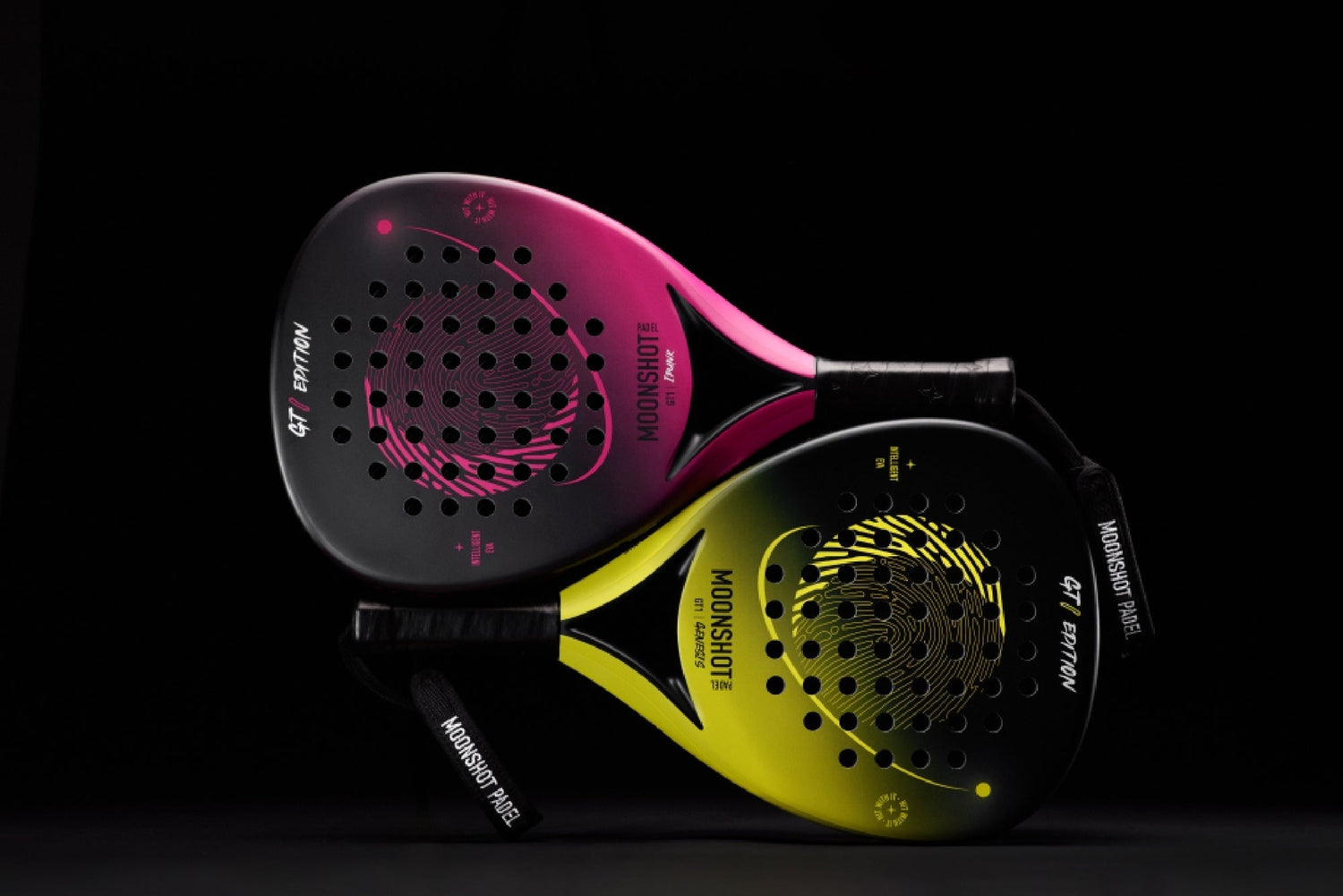 Two tessellating rackets in pink and yellow, stylised on a black background